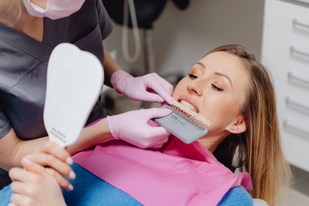 Dentist talking with a patient